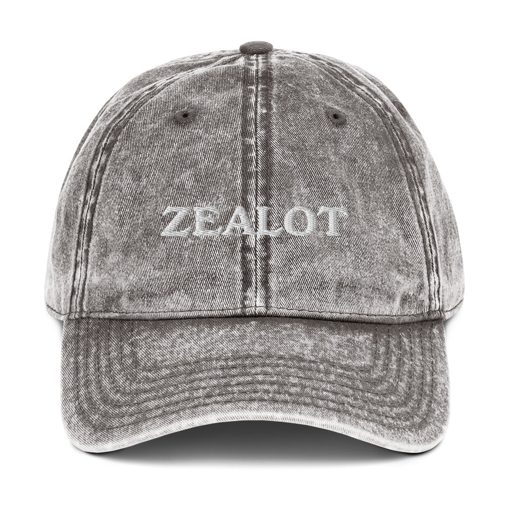 Gray Zealot Hat - Make a statement in our Zealot Hat. It's a comfortable and adjustable hat that comes in a variety of colors with "zealot", expertly embroidered on the front. A funny hat for everyday wear or a gift for your favorite zealot.