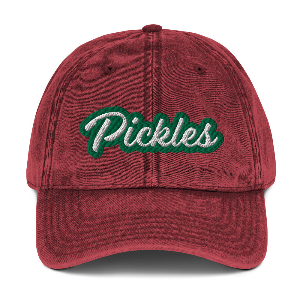 Maroon Pickles Hat - Upgrade your hat game with the Pickles Hat. It's a classic dad had with a funny design, expertly embroidered on the front. Show off your sense of humor and love for pickles with this unique accessory. It's sure to turn heads and have people asking where you got it.