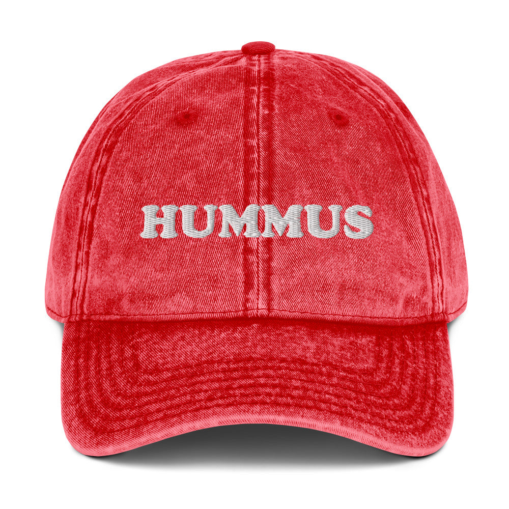 Red Hummus Hat - Looking for the perfect hat for the hummus lover in your life? Look no further than our Hummus Hat! Made with 100% cotton and featuring a funny embroidered design, this hat is sure to make a statement. Sport it at your next event and show off your love for hummus in style.