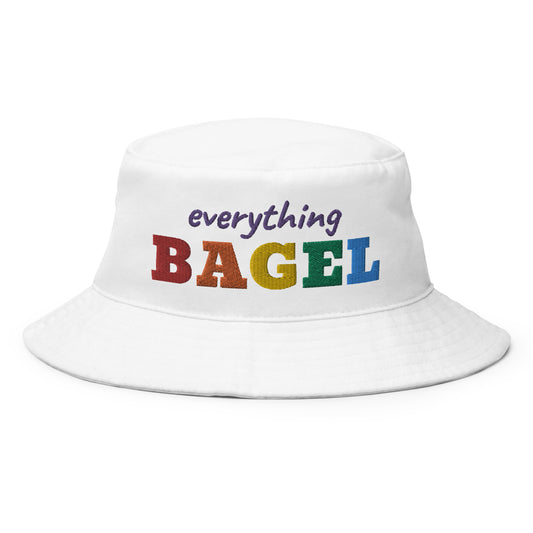 White Pride Bucket Hat for Bagel Lovers - Our everything bagel bucket hat is comfortable, cotton and perfect for everyday streetwear. It's a funny rainbow design hat for pride and bagel lovers and it's sure to turn heads. 