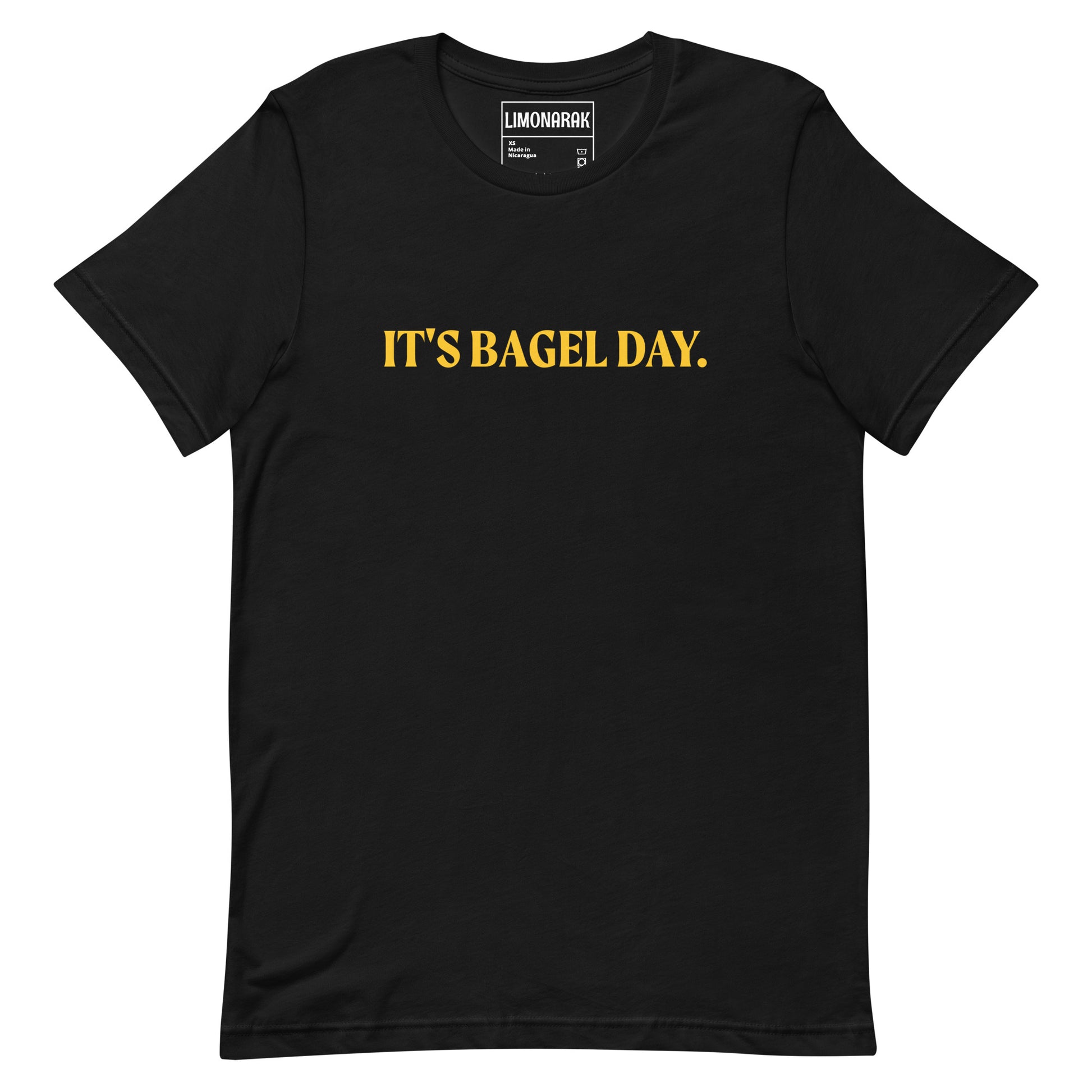 Black It's Bagel T-shirt - This It's Bagel Day T-Shirt is a must-have for any bagel enthusiast! Featuring a funny bagel saying, this shirt is perfect for expressing your love for all things bagel. It's a soft and comfortable tee that comes in a variety of colors. Perfect for everyday streetwear. Because everyday is bagel day!