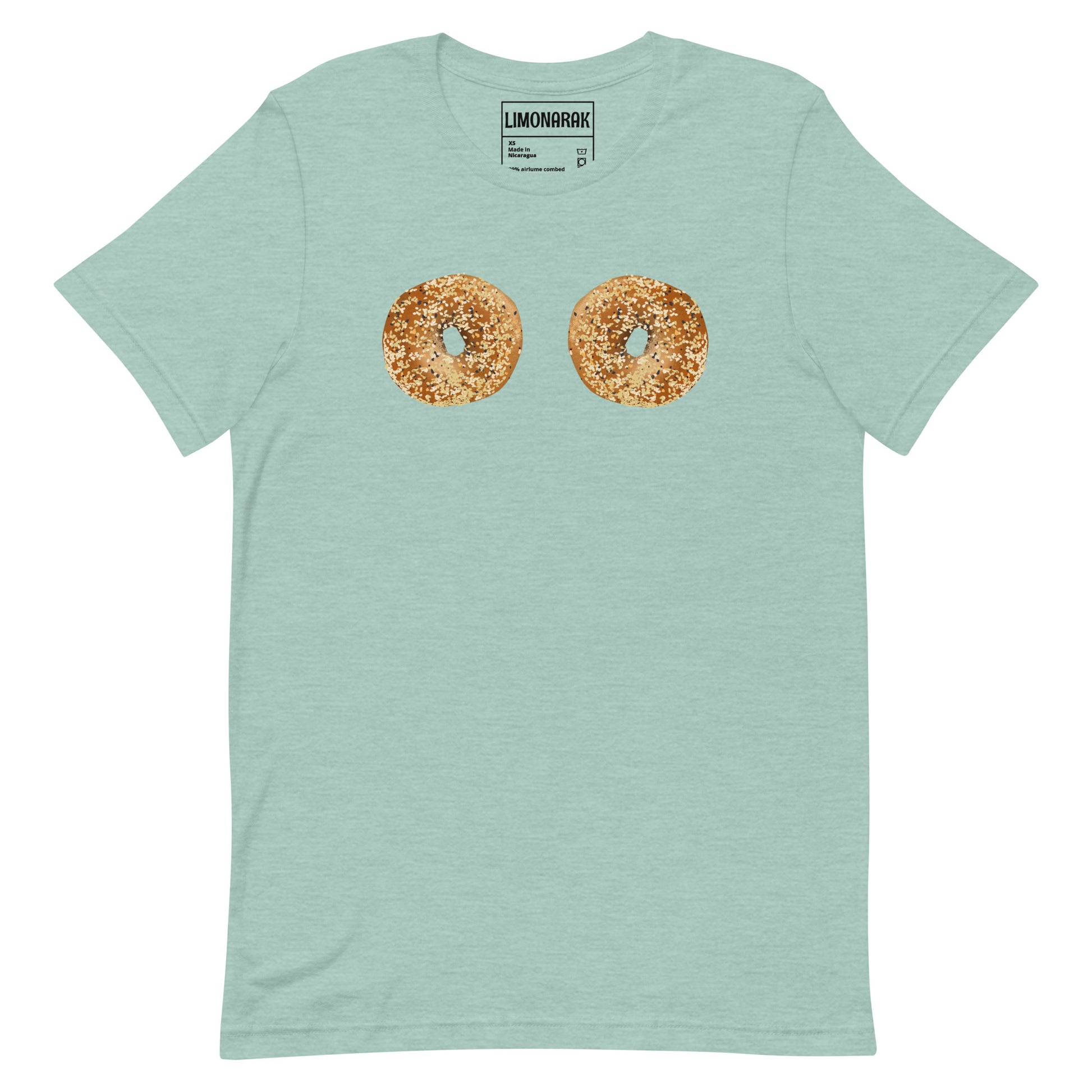 Dusty blue Bagel Boobs Shirt - Introducing our Bagel Boobs T-Shirt, featuring two everything bagels, expertly printed on the front. Express your love for bagels in our unique and funny bagel graphic tee. Made with high-quality cotton, this shirt is perfect for any bagel lover. Great for everyday streetwear or a gift for a bagel enthusiast.