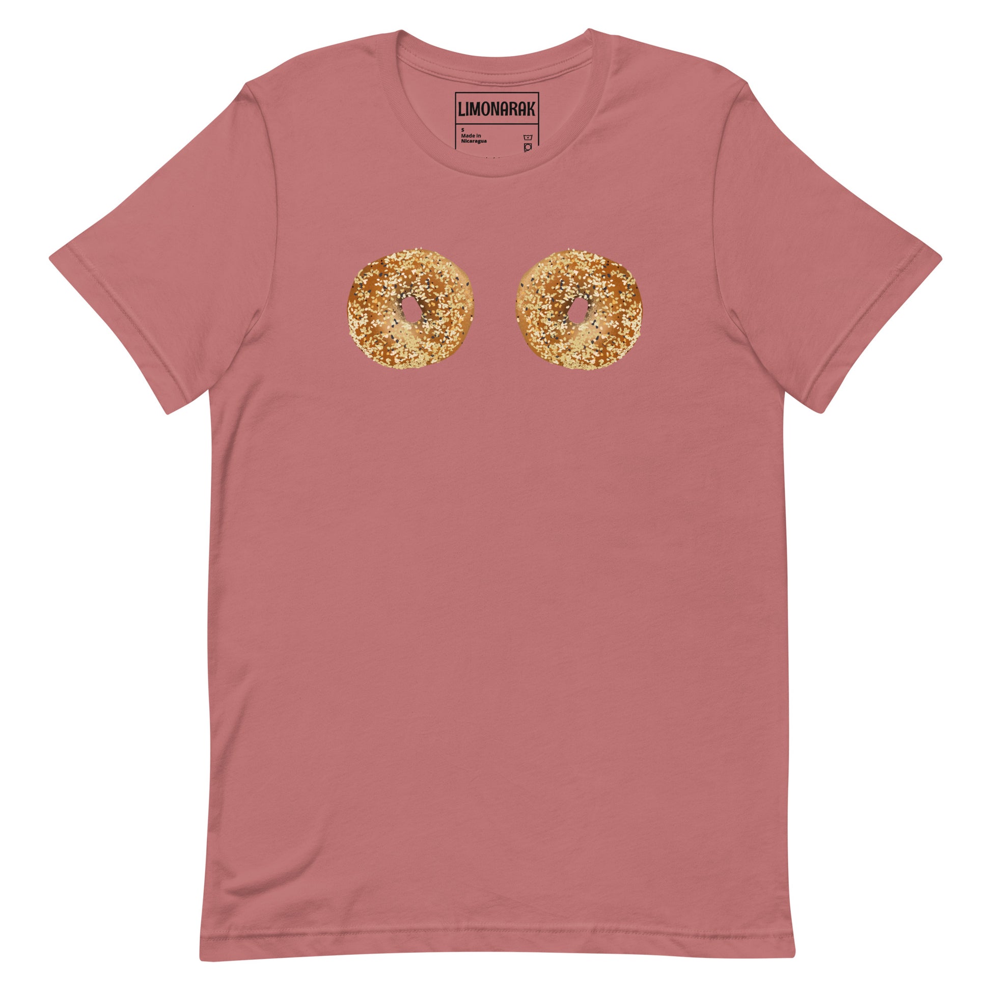 Mauve Bagel Boobs Shirt - Introducing our Bagel Boobs T-Shirt, featuring two everything bagels, expertly printed on the front. Express your love for bagels in our unique and funny bagel graphic tee. Made with high-quality cotton, this shirt is perfect for any bagel lover. Great for everyday streetwear or a gift for a bagel enthusiast.