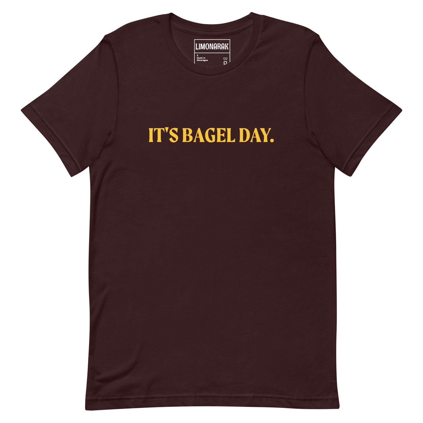 Dark Red Bagel T-shirt - This It's Bagel Day T-Shirt is a must-have for any bagel enthusiast! Featuring a funny bagel saying, this shirt is perfect for expressing your love for all things bagel. It's a soft and comfortable tee that comes in a variety of colors. Perfect for everyday streetwear. Because everyday is bagel day!