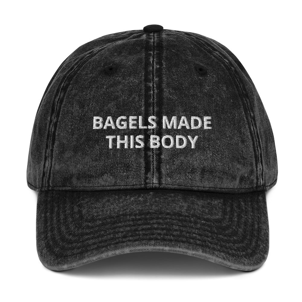 Black Bagels Hat - Our Bagels Made This Body Hat is comfortable with an adjustable closure and a funny bagel saying, expertly embroidered on the front. Eat bagels and make a statement in this bagels hat. Looking for something personalized? Shoot us a message!