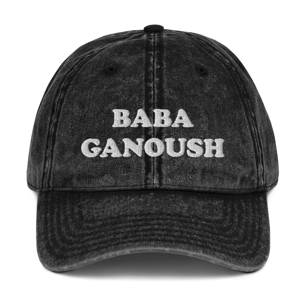 Black Baba Ganoush Hat - Love baba ganoush? Introducing our Baba Ganoush Dad Hat. It's the perfect hat for baba ganoush enthusiasts. Eat your favorite Middle Eastern eggplant in style. Celebrate your favorite Mizrahi foods in our clothing and accessories for Jews and foodies of all kinds. Looking for something personalized? Shoot us a message!