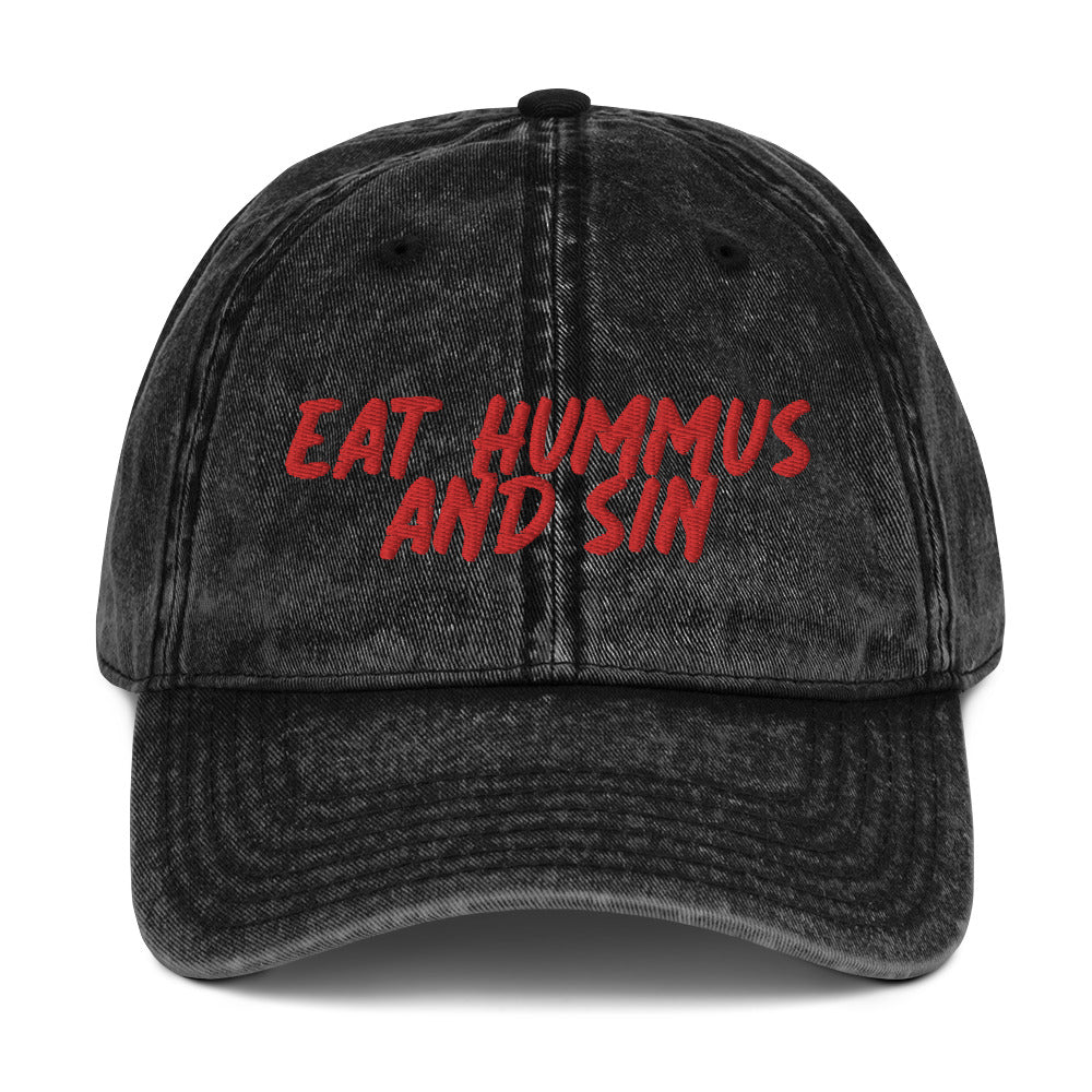 Black Hummus Hat - Love Hummus? This funny hummus hat is just what you need. Eat your favorite hummus and let your hat do the talking. It's made of comfortable cotton and comes in a variety of colors with a red embroidered "Eat Hummus And Sin". Perfect for everyday streetwear or a gift for a hummus enthusiast.