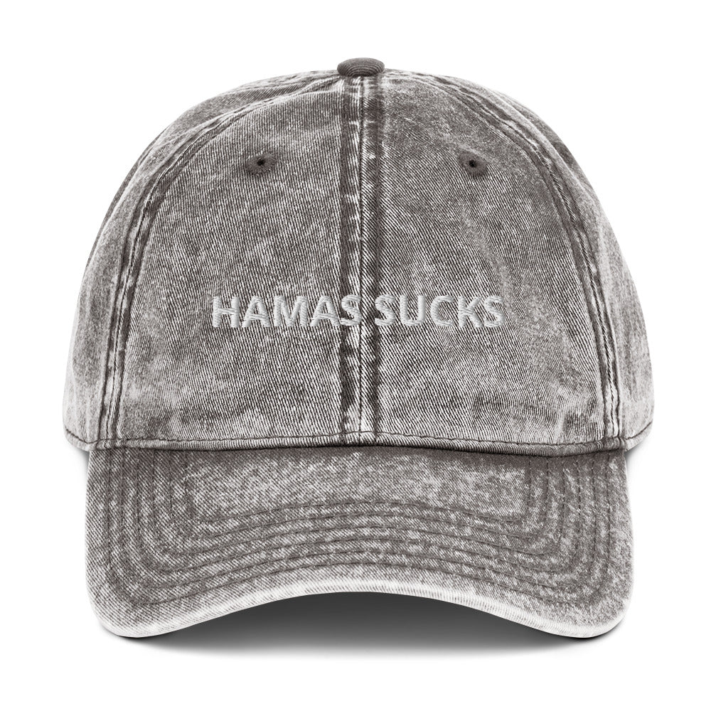 Gray Hamas Sucks Hat - Hamas sucks! Let your hat do the talking in this Hamas Sucks Hat. It's a comfortable cotton hat with an anti-Hamas saying, expertly embroidered on the front. Stand out and make a statement in this classic dad hat.