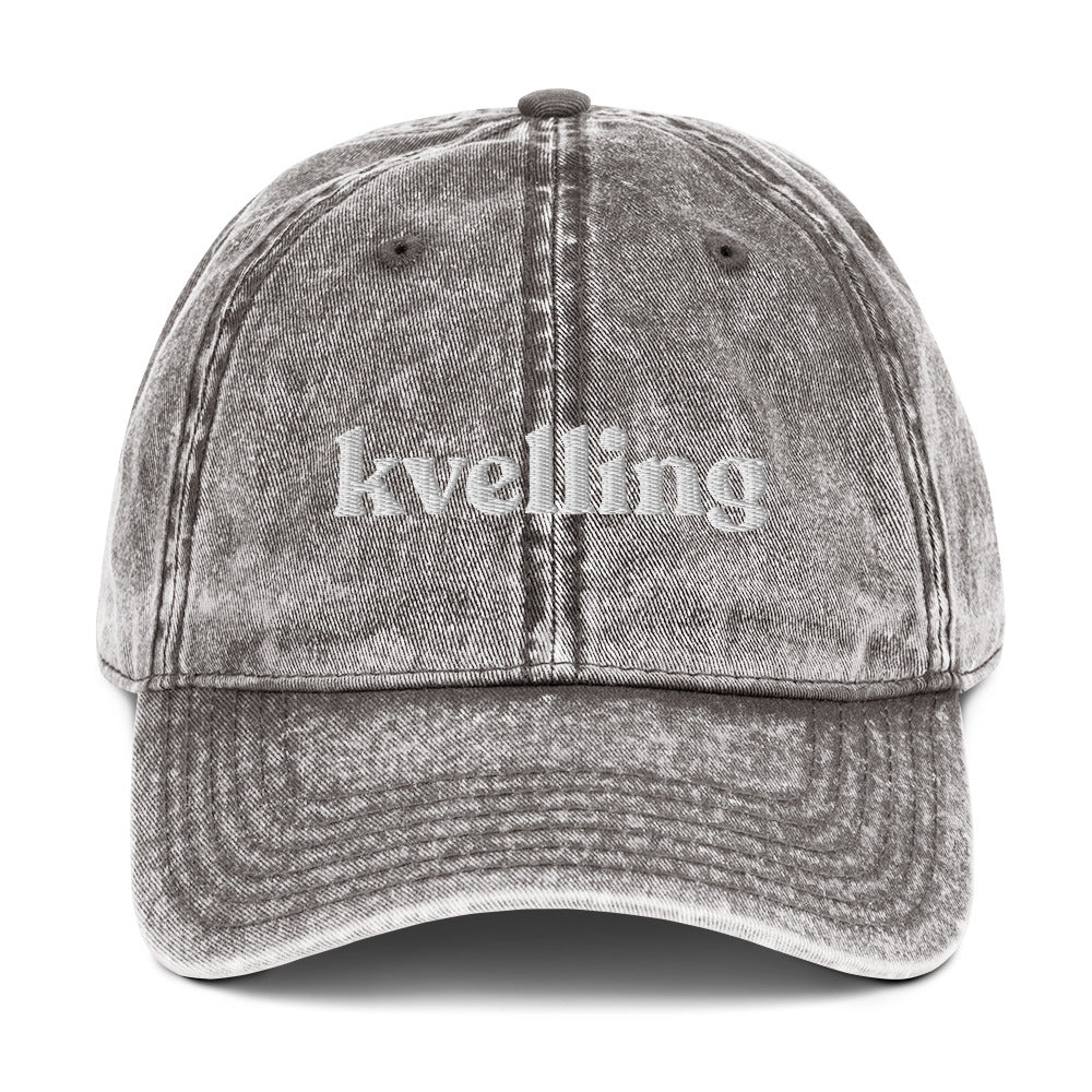 Gray Kvelling Hat - We're kvelling over this yiddish dad hat. It's a classic dad hat with the word "kvellling", expertly embroidered on the front. A funny Jewish hat for everyday streetwear or a gift for your favorite yid. This hat comes in a variety of colors with an adjustable closure and classic dad hat fit.