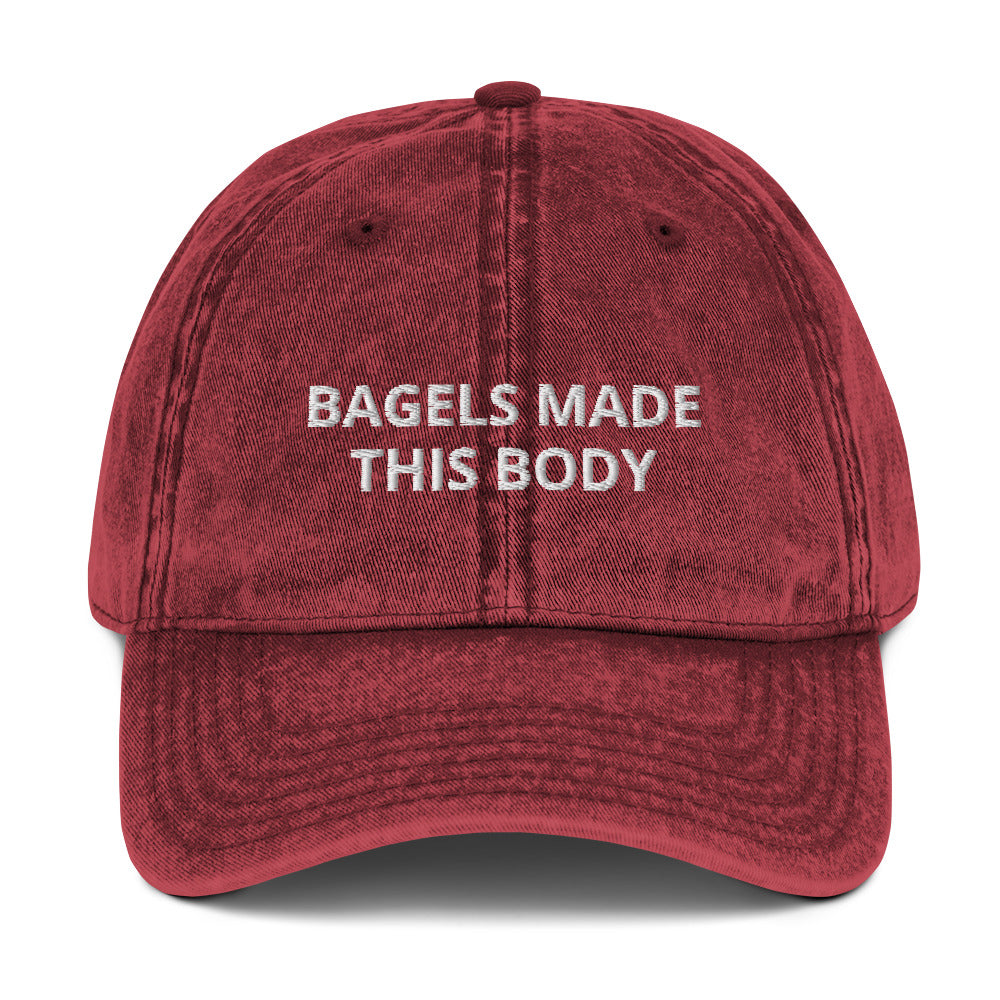 Maroon Bagels Hat - Our Bagels Made This Body Hat is comfortable with an adjustable closure and a funny bagel saying, expertly embroidered on the front. Eat bagels and make a statement in this bagels hat. Looking for something personalized? Shoot us a message!