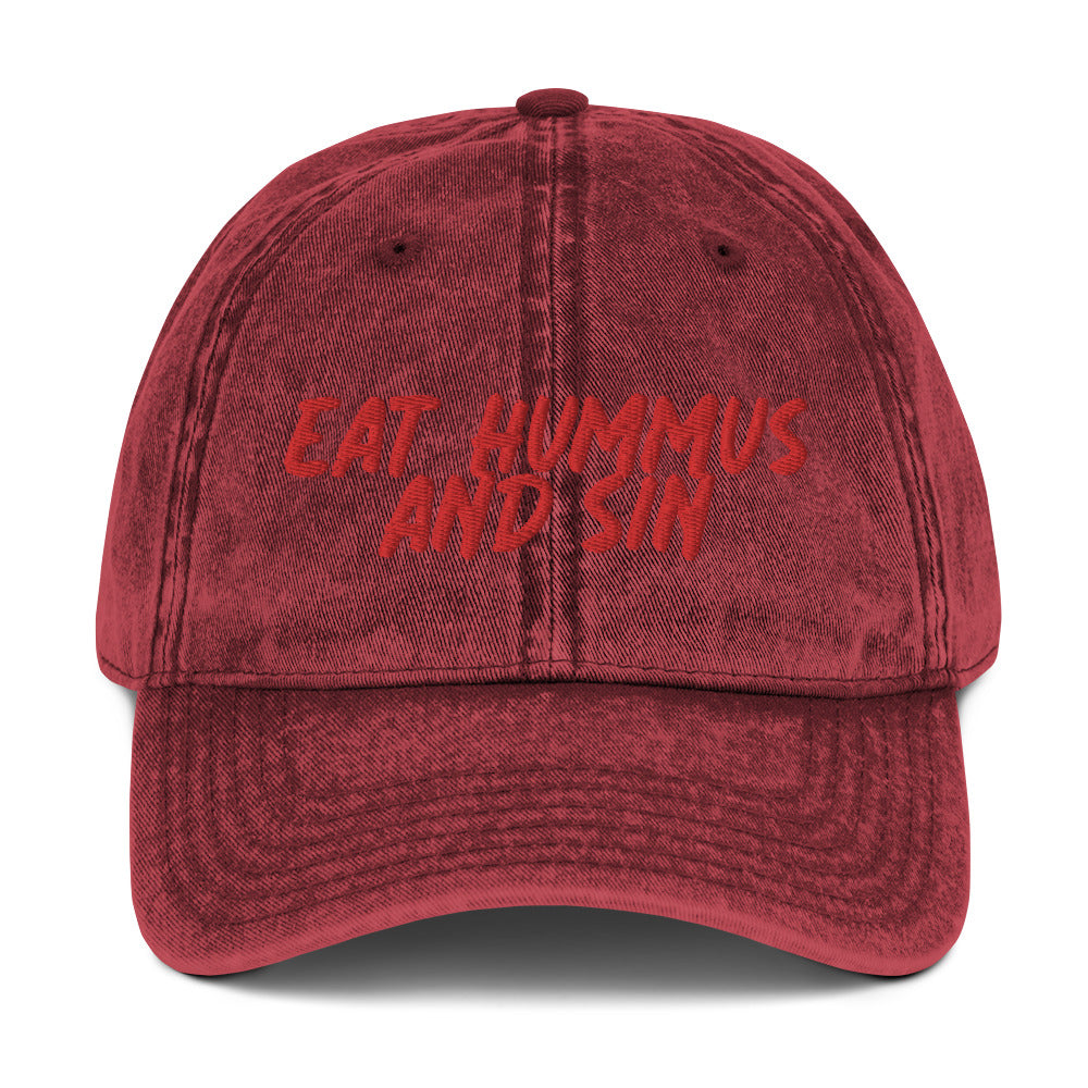 Maroon Hummus Hat - Love Hummus? This funny hummus hat is just what you need. Eat your favorite hummus and let your hat do the talking. It's made of comfortable cotton and comes in a variety of colors with a red embroidered "Eat Hummus And Sin". Perfect for everyday streetwear or a gift for a hummus enthusiast.