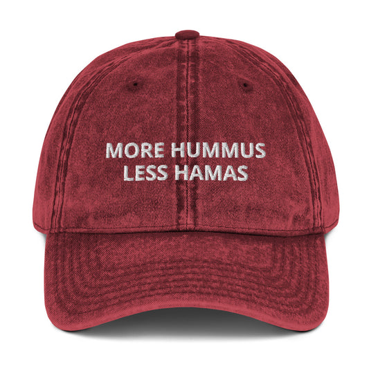 Maroon More Hummus Less Hamas Hat - Hamas sucks! Let your hat do the talking in this More Hummus Less Hamas Hat. It's a comfortable cotton hat with an anti-Hamas saying, expertly embroidered on the front. Stand out and make a statement in this classic dad hat against terrorism.