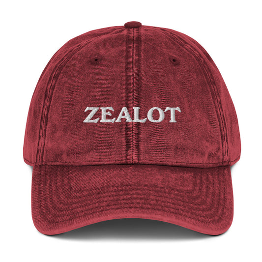 Maroon Zealot Hat - Make a statement in our Zealot Hat. It's a comfortable and adjustable hat that comes in a variety of colors with "zealot", expertly embroidered on the front. A funny hat for everyday wear or a gift for your favorite zealot.