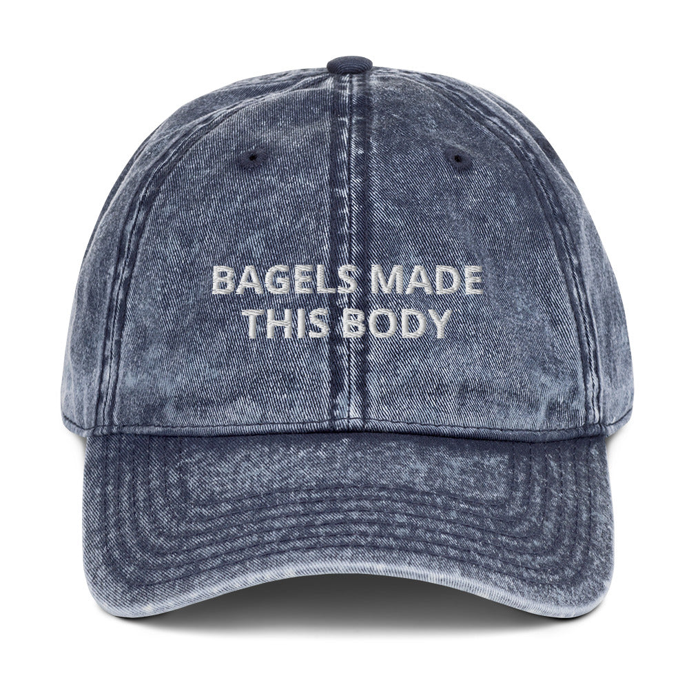 Blue Bagels Hat - Our Bagels Made This Body Hat is comfortable with an adjustable closure and a funny bagel saying, expertly embroidered on the front. Eat bagels and make a statement in this bagels hat. Looking for something personalized? Shoot us a message!