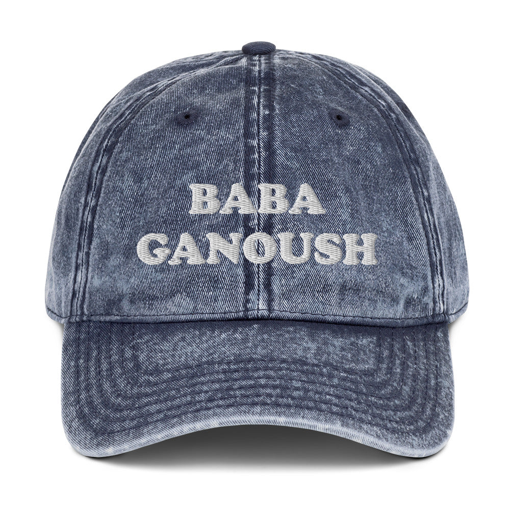 Blue Baba Ganoush Hat - Love baba ganoush? Introducing our Baba Ganoush Dad Hat. It's the perfect hat for baba ganoush enthusiasts. Eat your favorite Middle Eastern eggplant in style. Celebrate your favorite Mizrahi foods in our clothing and accessories for Jews and foodies of all kinds. Looking for something personalized? Shoot us a message!