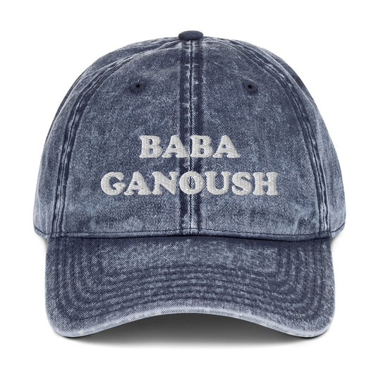 Blue Baba Ganoush Hat - Love baba ganoush? Introducing our Baba Ganoush Dad Hat. It's the perfect hat for baba ganoush enthusiasts. Eat your favorite Middle Eastern eggplant in style. Celebrate your favorite Mizrahi foods in our clothing and accessories for Jews and foodies of all kinds. Looking for something personalized? Shoot us a message!