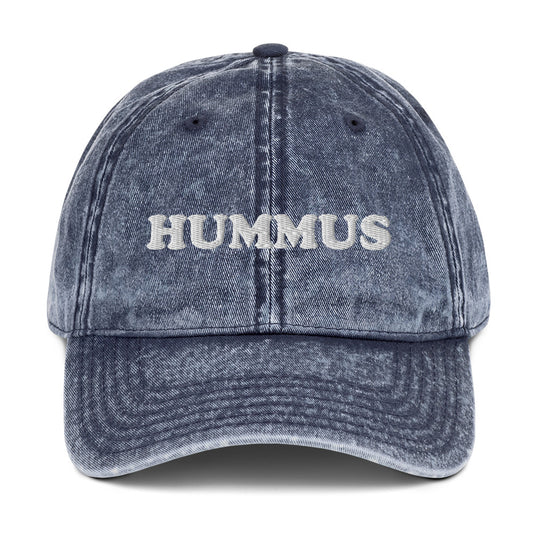 Blue Hummus Hat - Looking for the perfect hat for the hummus lover in your life? Look no further than our Hummus Hat! Made with 100% cotton and featuring a funny embroidered design, this hat is sure to make a statement. Sport it at your next event and show off your love for hummus in style.