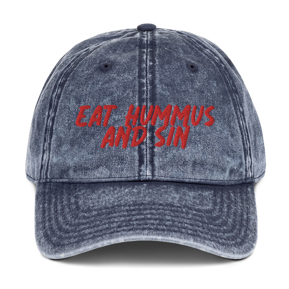 Blue Hummus Hat - Love Hummus? This funny hummus hat is just what you need. Eat your favorite hummus and let your hat do the talking. It's made of comfortable cotton and comes in a variety of colors with a red embroidered "Eat Hummus And Sin". Perfect for everyday streetwear or a gift for a hummus enthusiast.