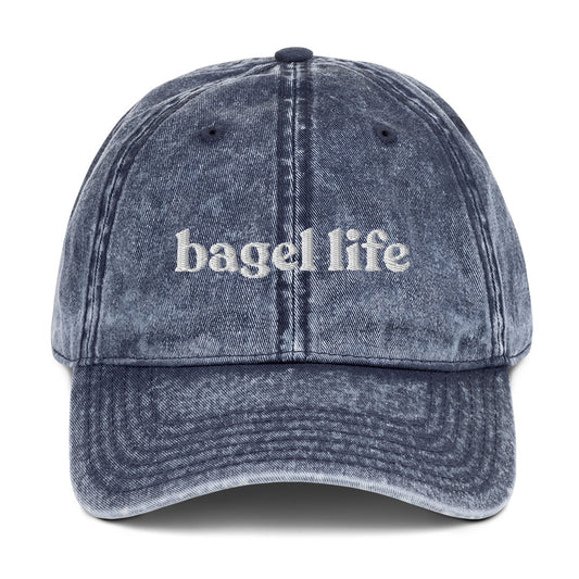 Blue Bagel Life Hat - Living that bagel life? Looking for a gift for a bagel enthusiast? This bagel hat might be just for you. It's a funny bagel hat that's expertly embroidered and made just for you. Make a statement and eat your favorite bagels in this funny Jewish hat. The perfect foodie hat for bagel lovers and foodies of all kinds.