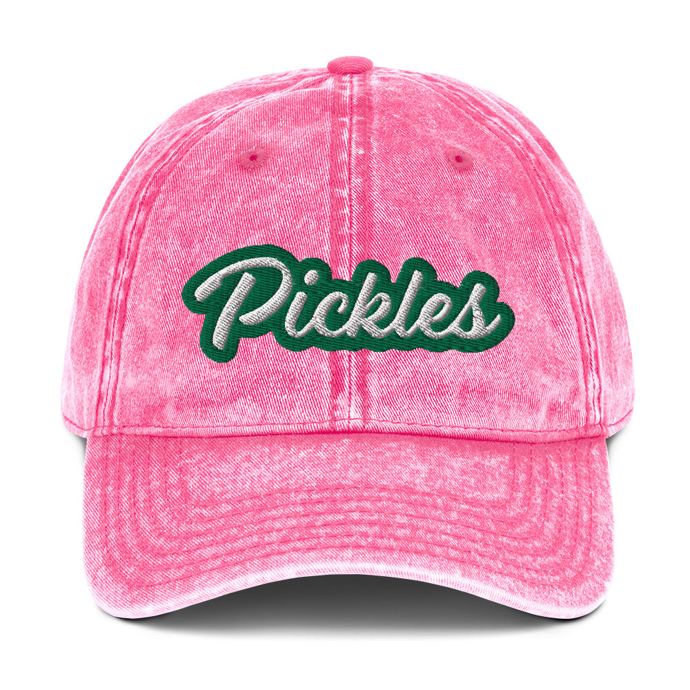 Pink Pickles Hat - Upgrade your hat game with the Pickles Hat. It's a classic dad had with a funny design, expertly embroidered on the front. Show off your sense of humor and love for pickles with this unique accessory. It's sure to turn heads and have people asking where you got it.