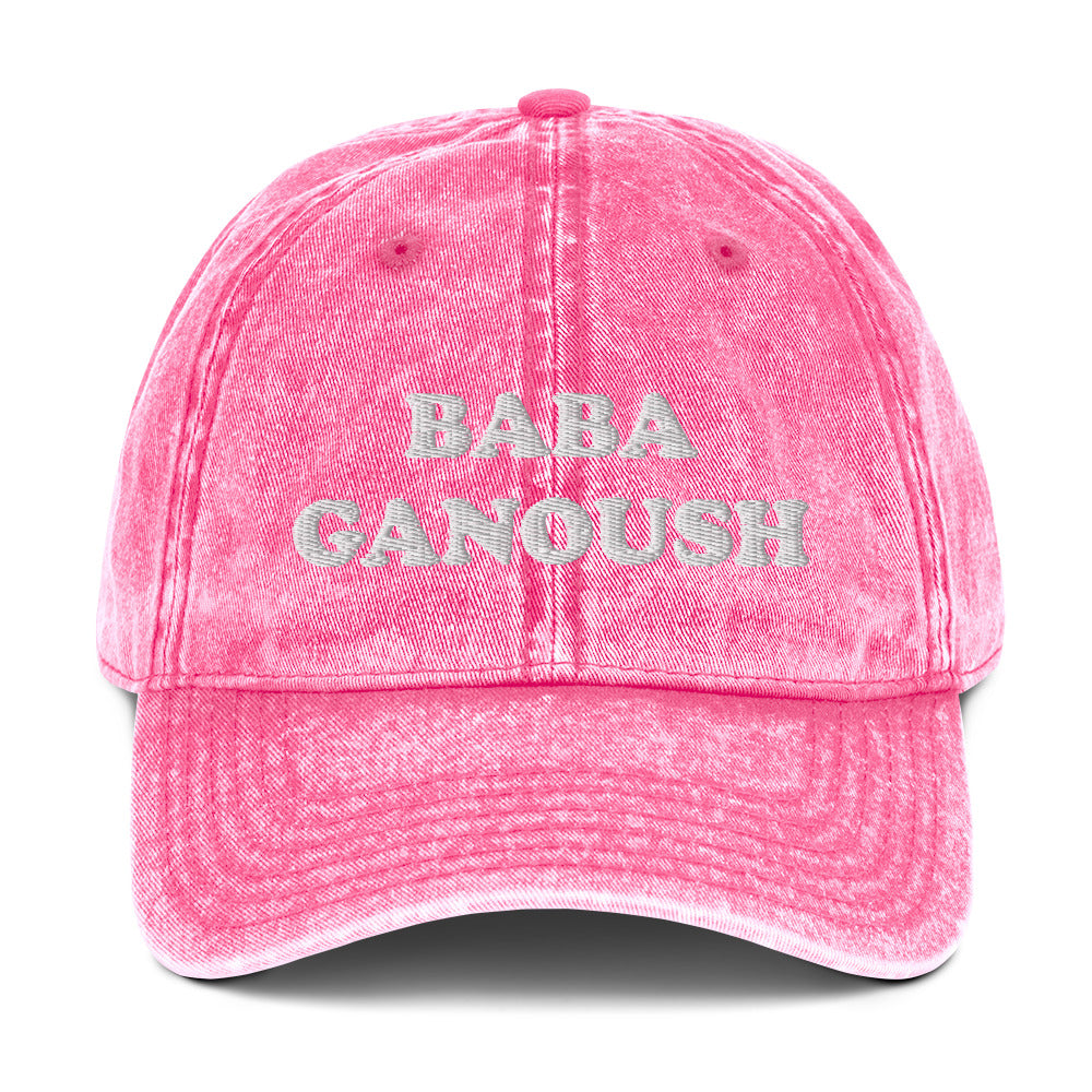 Pink Baba Ganoush Hat - Love baba ganoush? Introducing our Baba Ganoush Dad Hat. It's the perfect hat for baba ganoush enthusiasts. Eat your favorite Middle Eastern eggplant in style. Celebrate your favorite Mizrahi foods in our clothing and accessories for Jews and foodies of all kinds. Looking for something personalized? Shoot us a message!